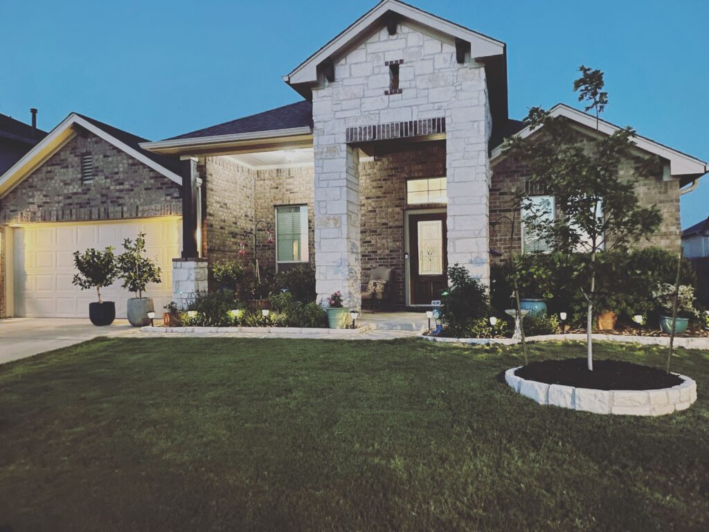 Freshly painted home exterior by a professional painting company in Leander, TX